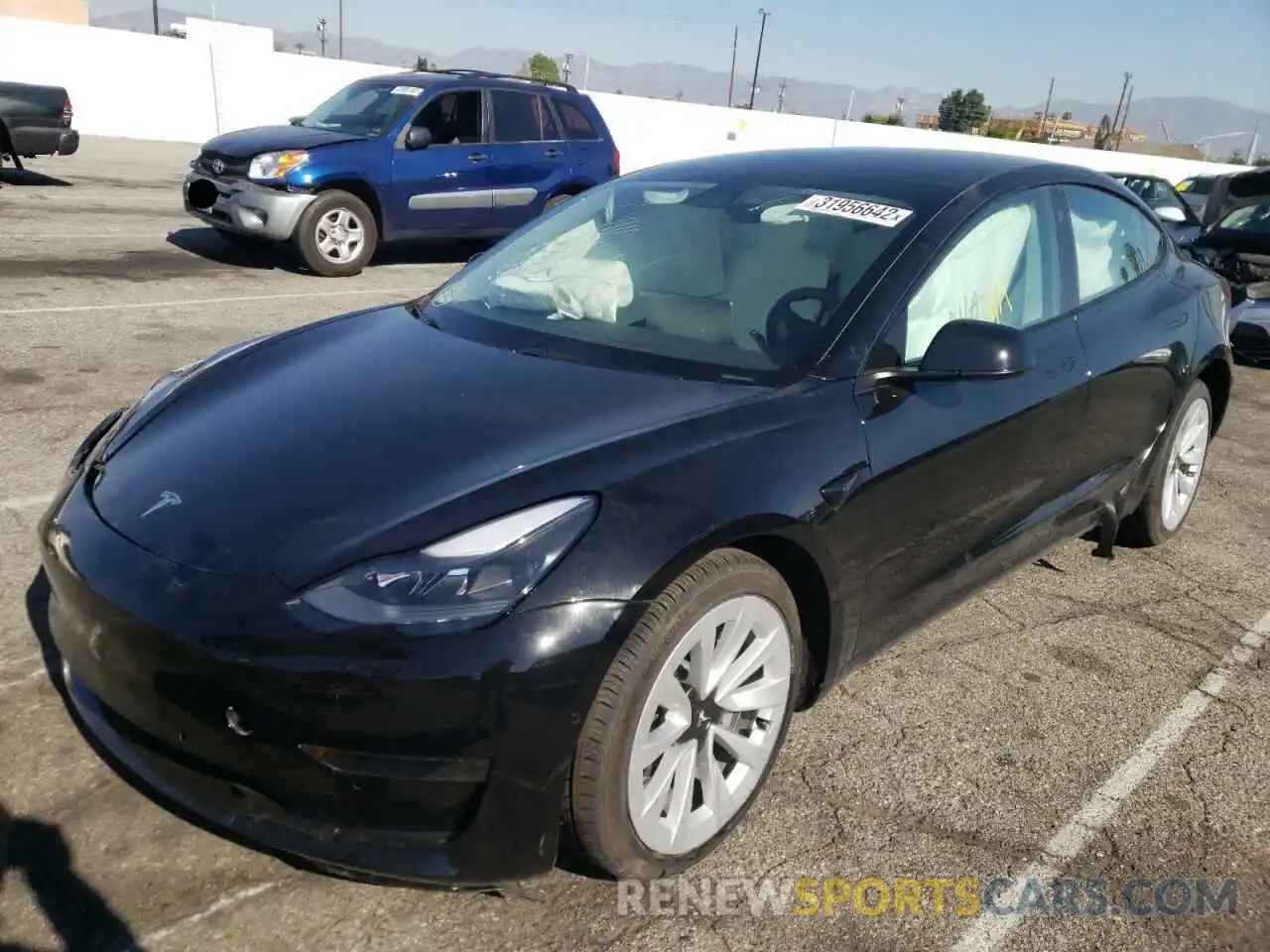 2 Photograph of a damaged car 5YJ3E1EA9MF994337 TESLA MODEL 3 2021