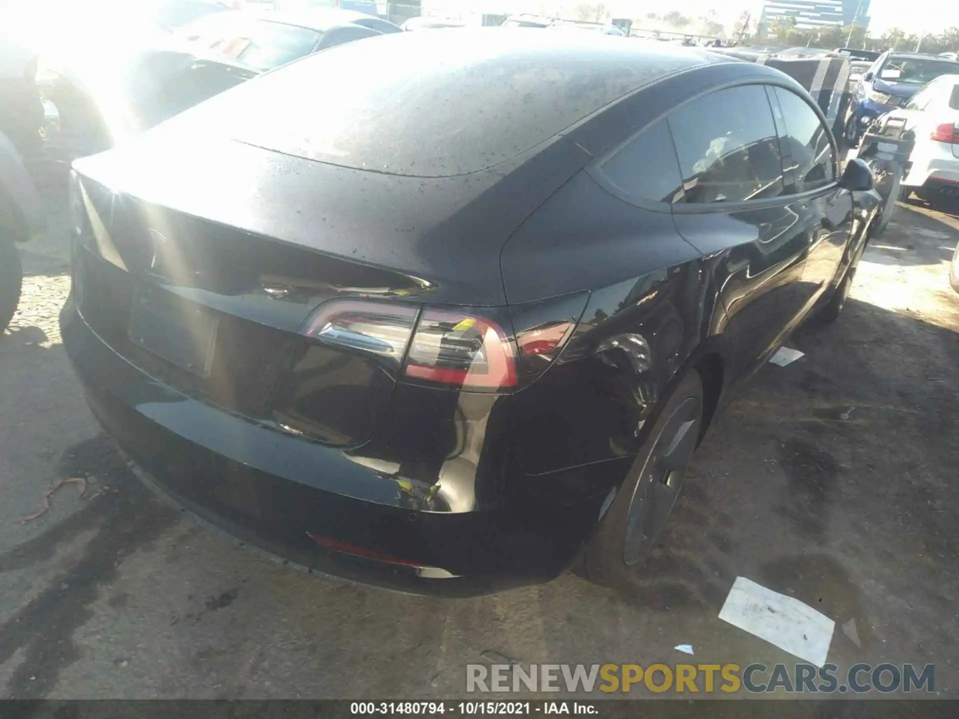 4 Photograph of a damaged car 5YJ3E1EAXMF027090 TESLA MODEL 3 2021