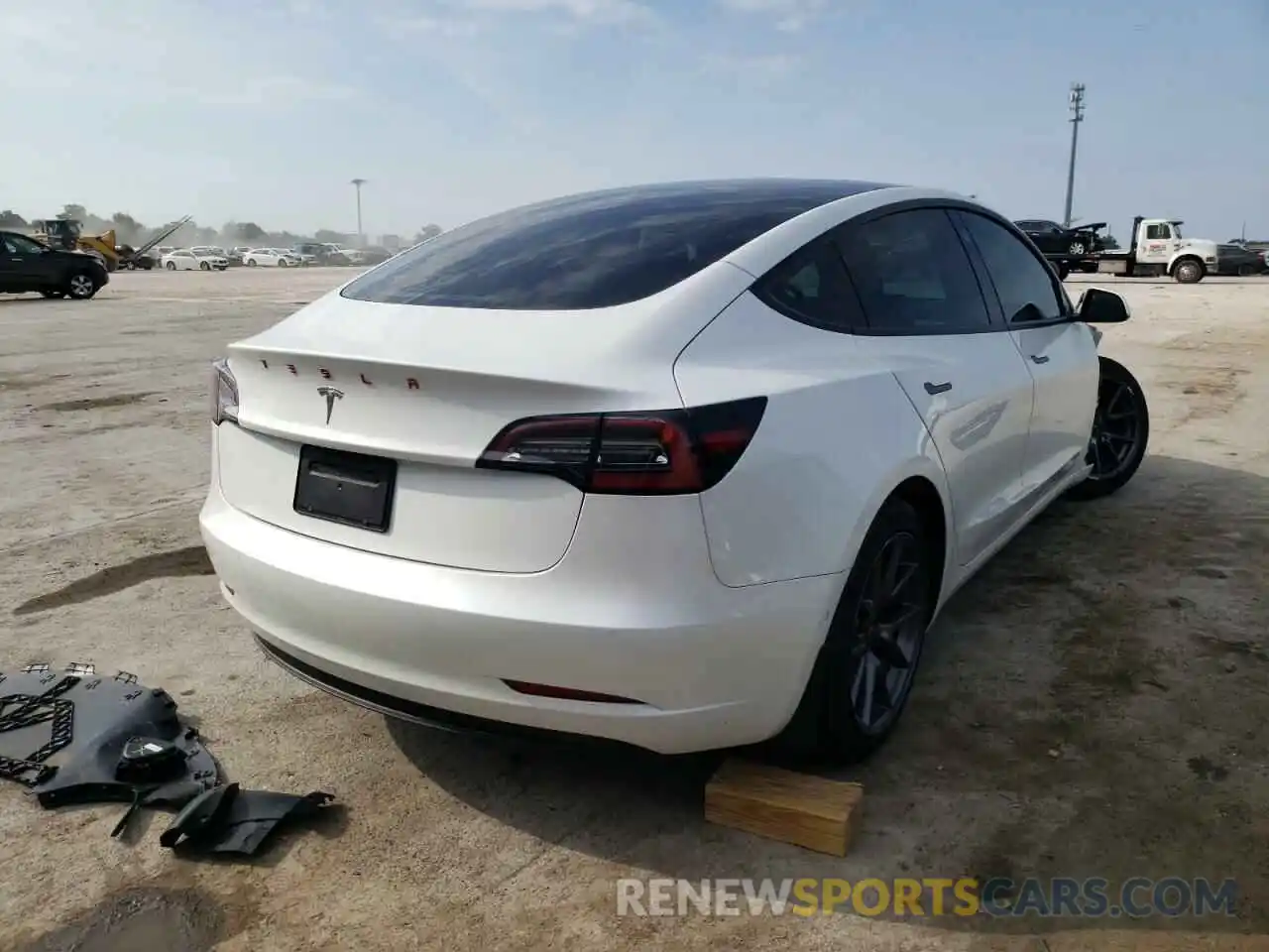 4 Photograph of a damaged car 5YJ3E1EAXMF062096 TESLA MODEL 3 2021