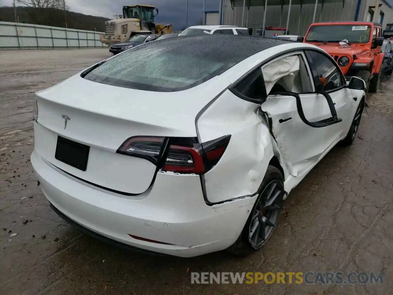 4 Photograph of a damaged car 5YJ3E1EAXMF082820 TESLA MODEL 3 2021