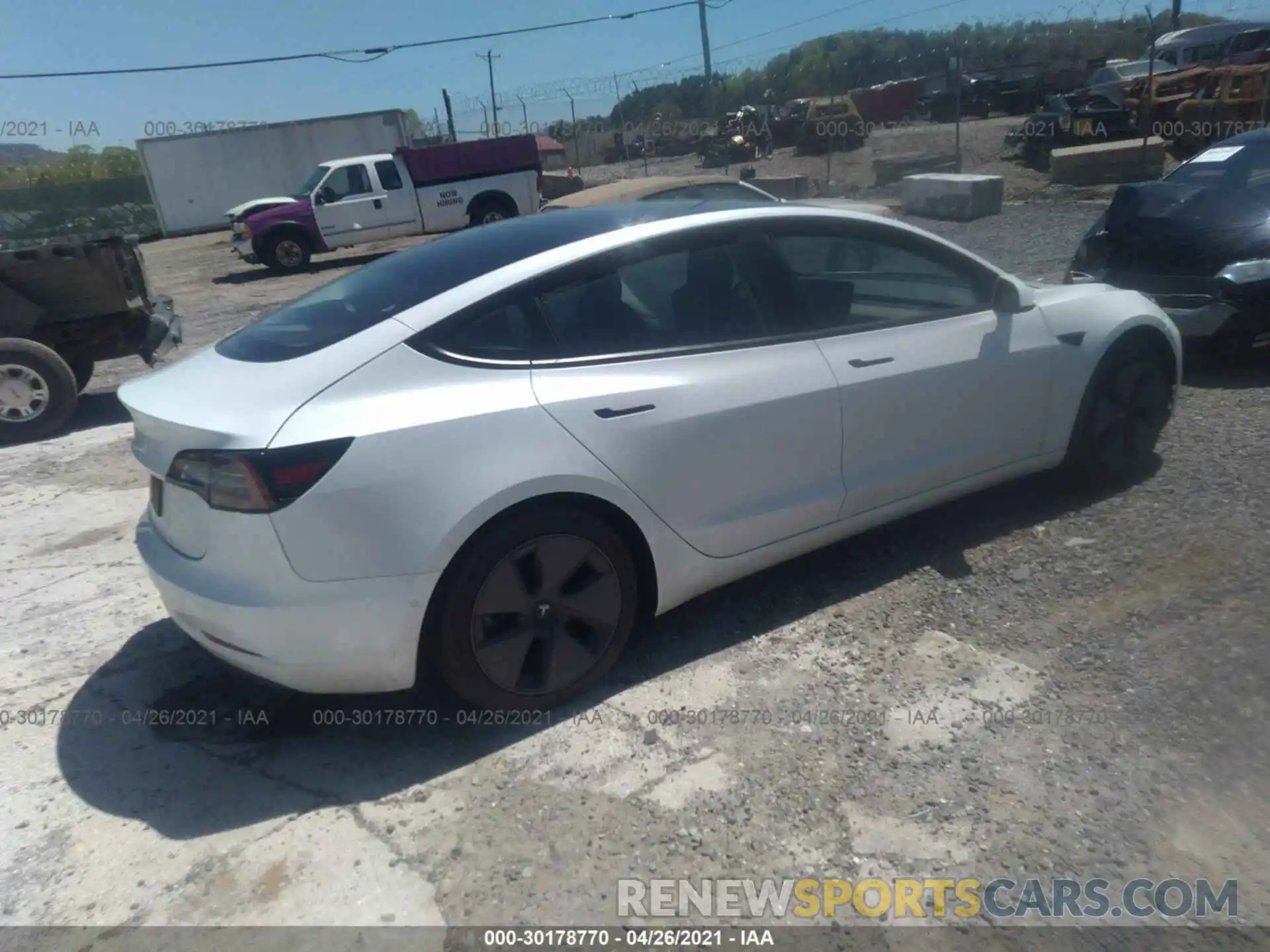 4 Photograph of a damaged car 5YJ3E1EAXMF854314 TESLA MODEL 3 2021