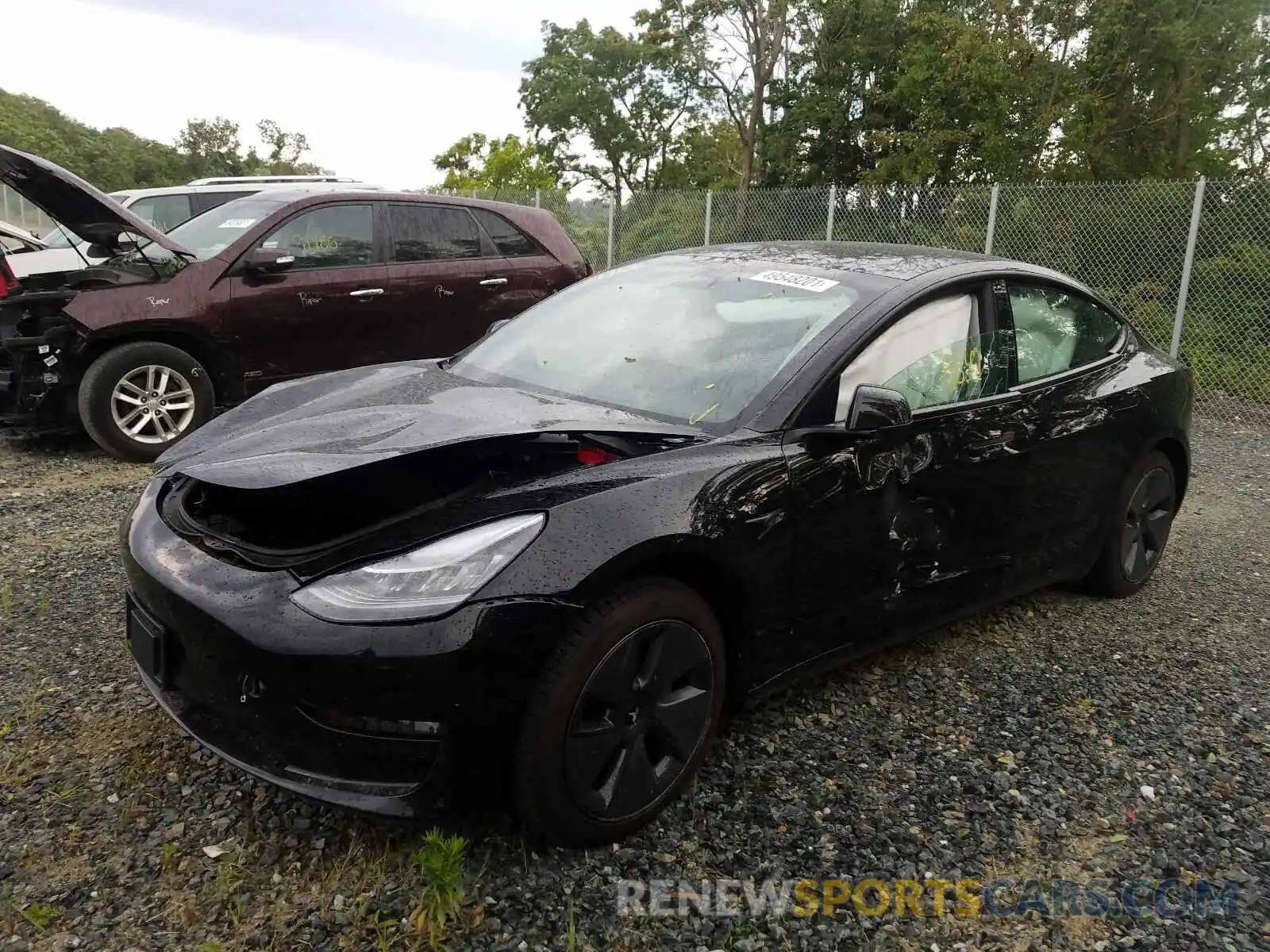 2 Photograph of a damaged car 5YJ3E1EAXMF854443 TESLA MODEL 3 2021