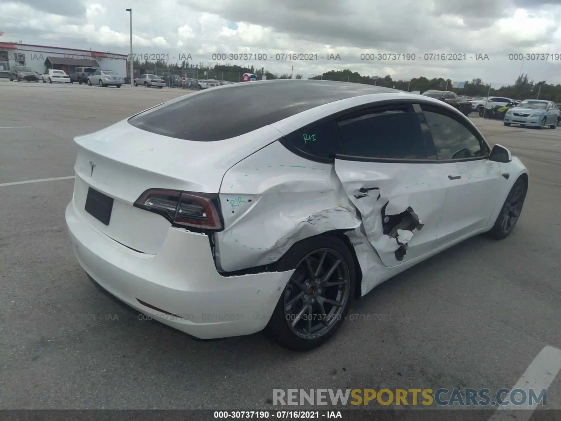 4 Photograph of a damaged car 5YJ3E1EAXMF854815 TESLA MODEL 3 2021