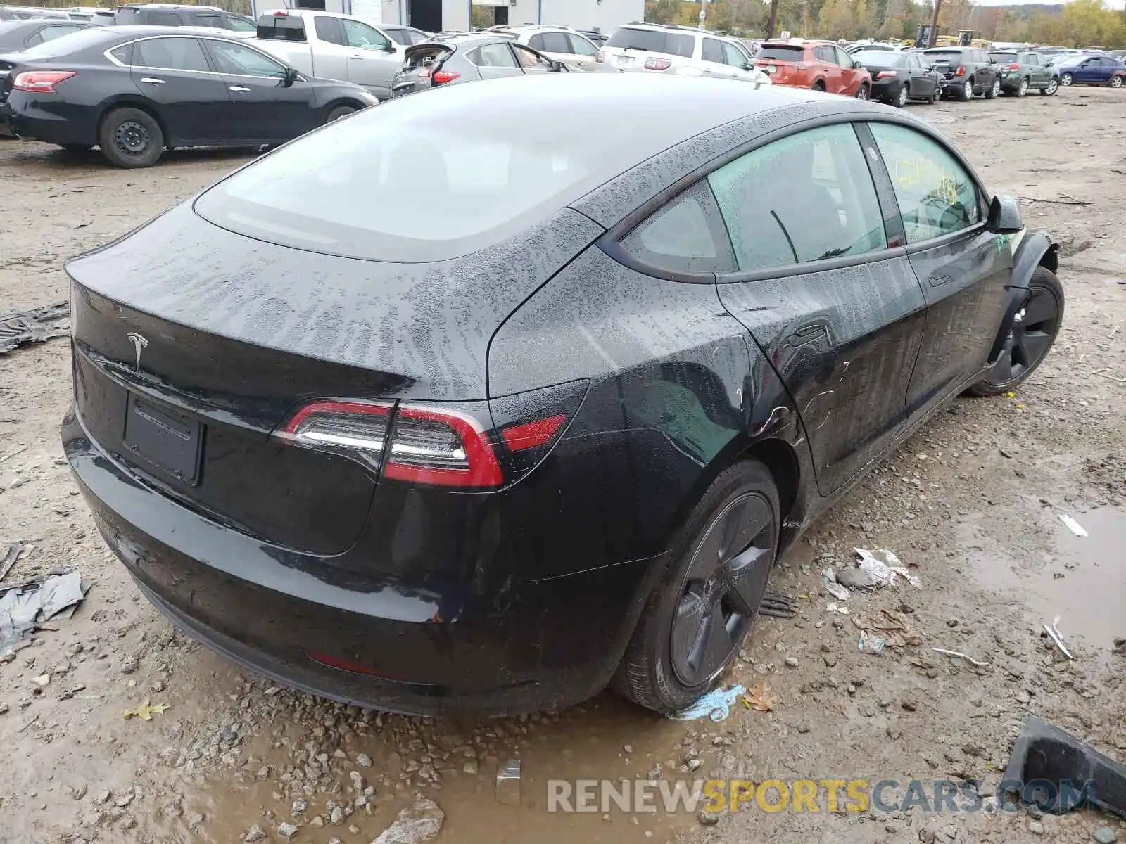 4 Photograph of a damaged car 5YJ3E1EAXMF857567 TESLA MODEL 3 2021