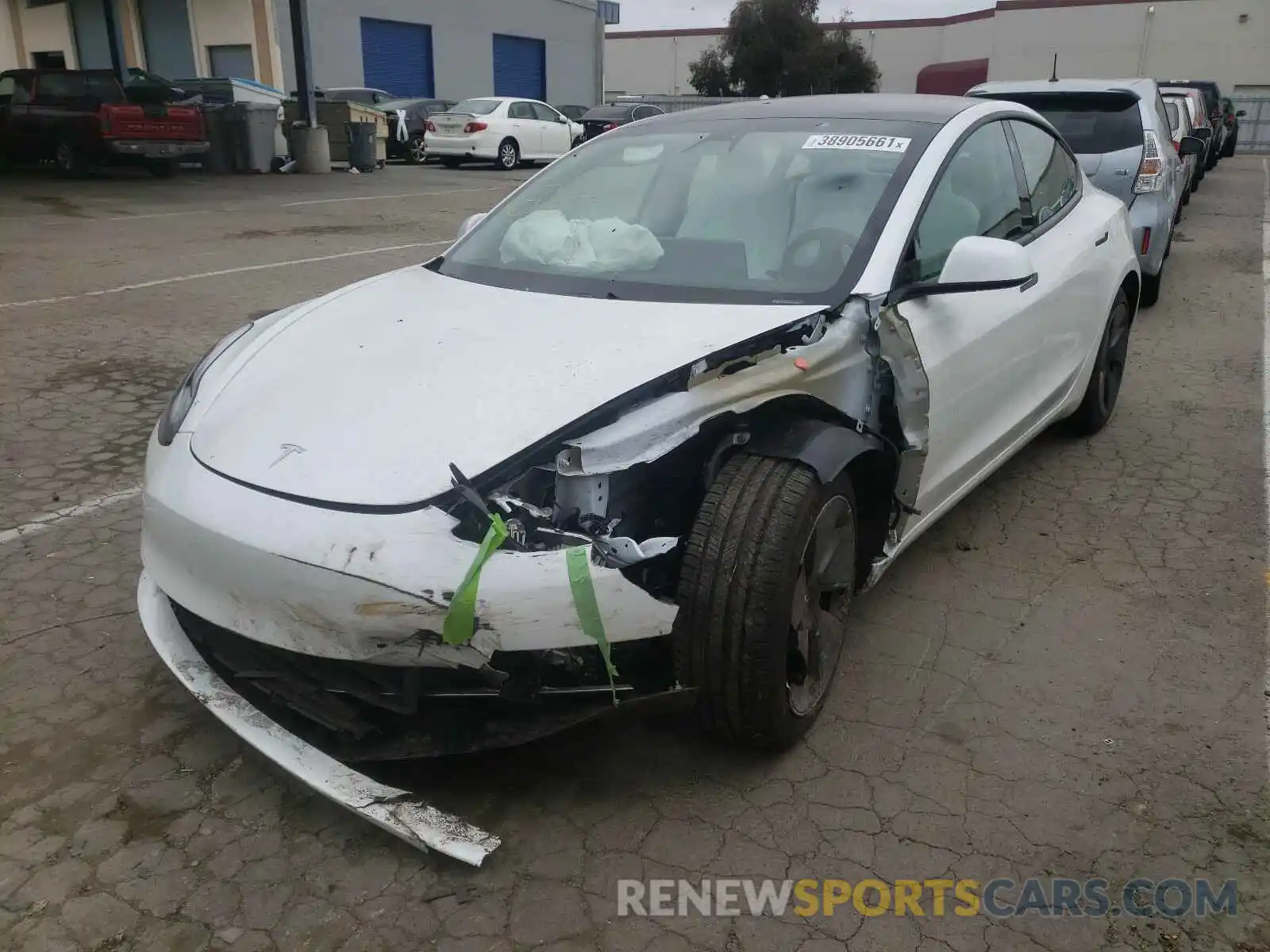 2 Photograph of a damaged car 5YJ3E1EAXMF858881 TESLA MODEL 3 2021