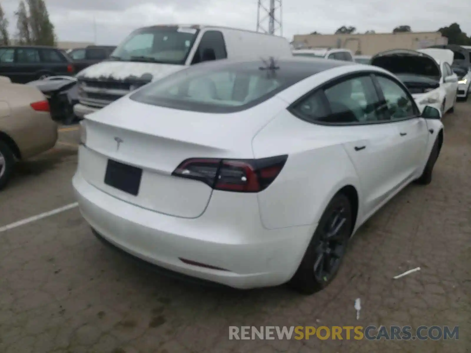 4 Photograph of a damaged car 5YJ3E1EAXMF858881 TESLA MODEL 3 2021