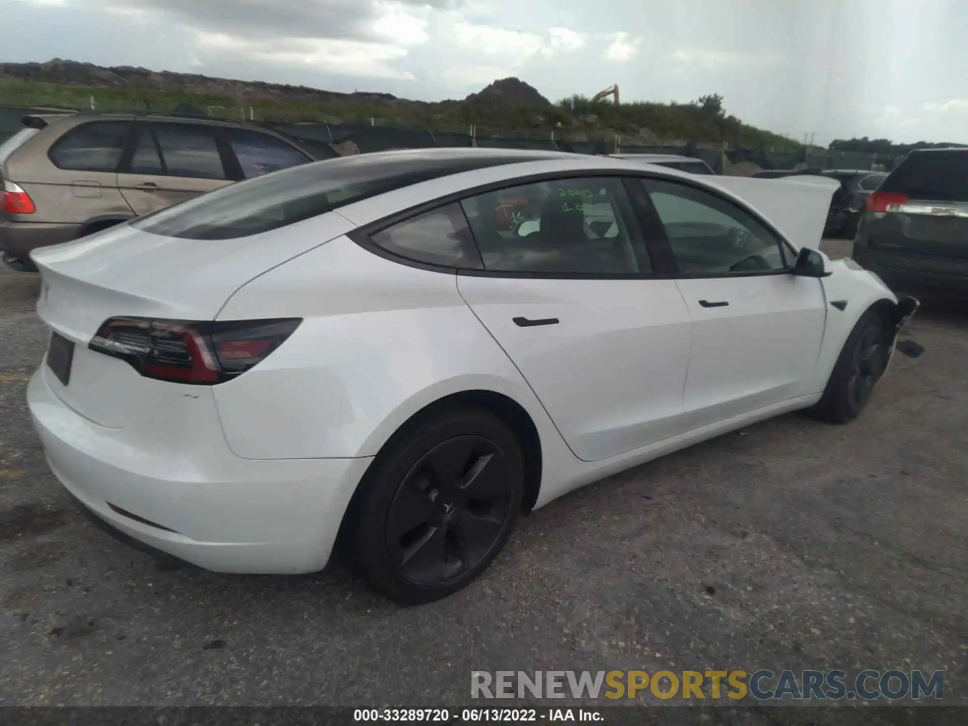 4 Photograph of a damaged car 5YJ3E1EAXMF859707 TESLA MODEL 3 2021