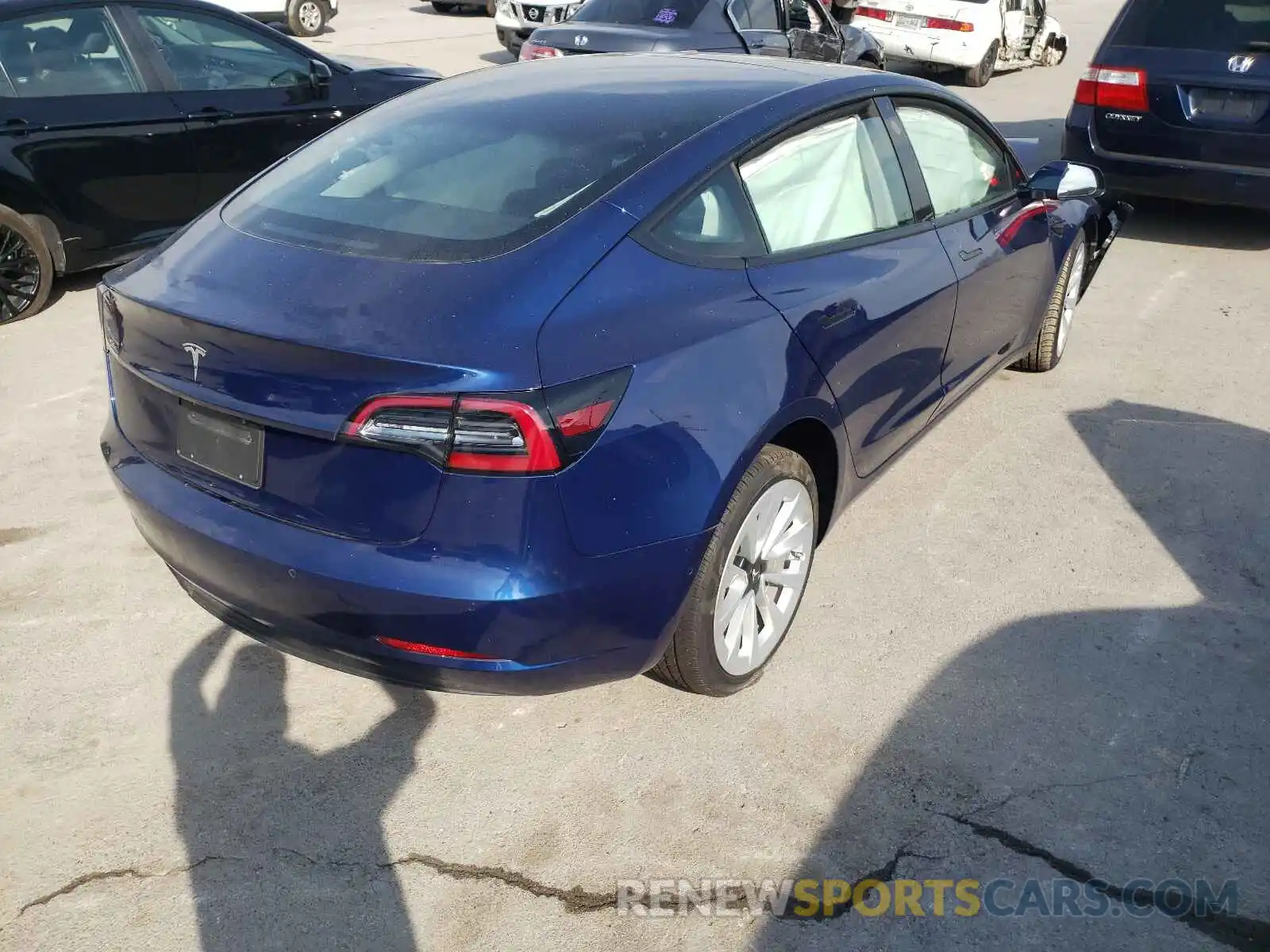 4 Photograph of a damaged car 5YJ3E1EAXMF870478 TESLA MODEL 3 2021