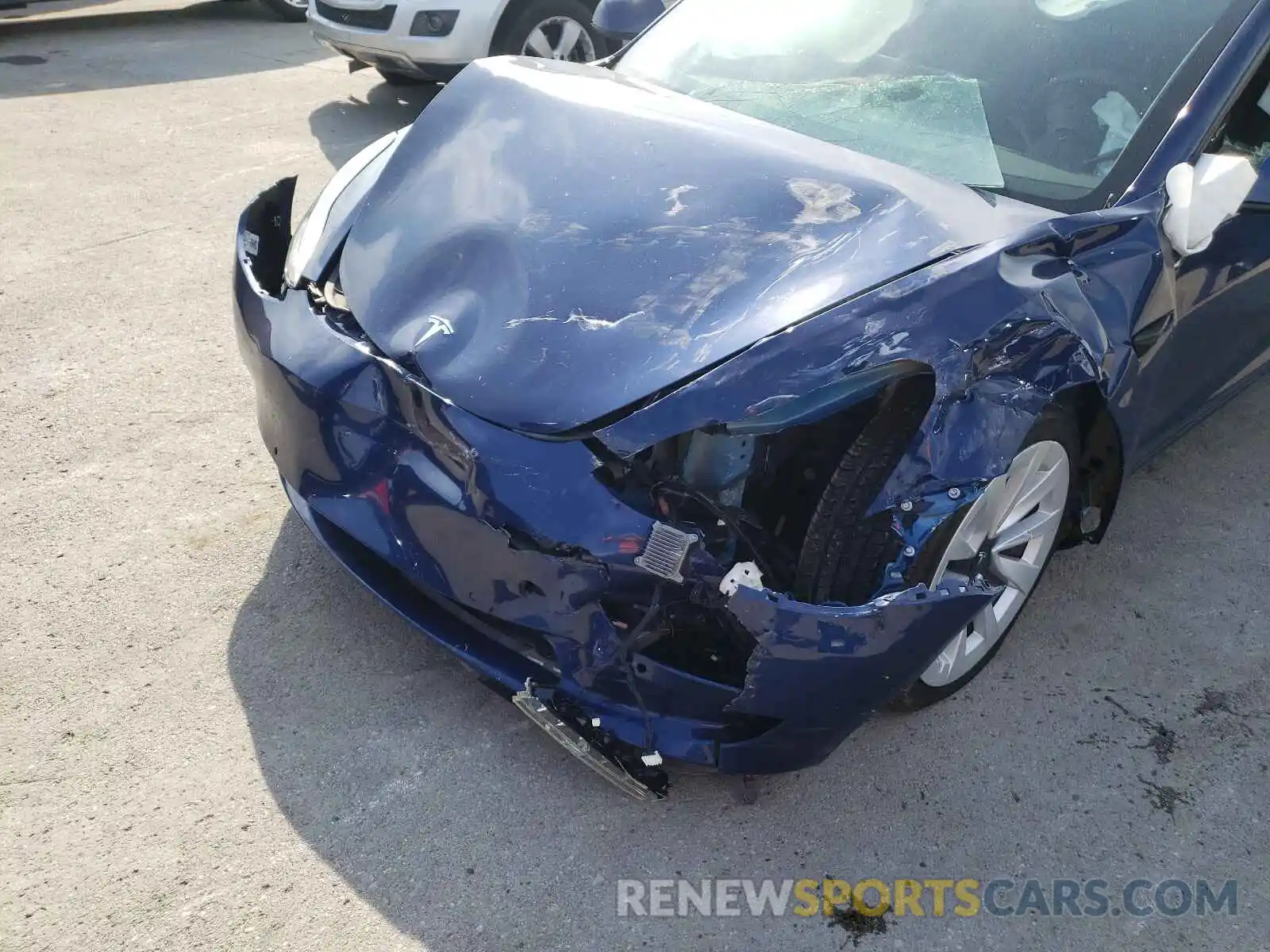 9 Photograph of a damaged car 5YJ3E1EAXMF870478 TESLA MODEL 3 2021