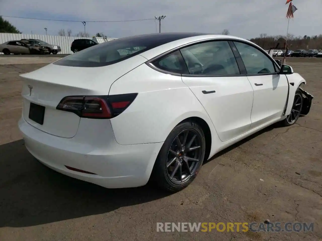 4 Photograph of a damaged car 5YJ3E1EAXMF915953 TESLA MODEL 3 2021