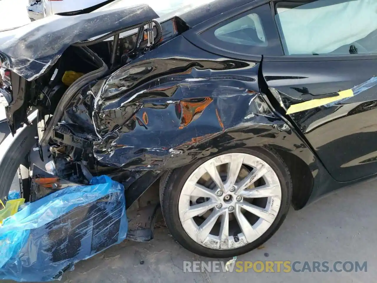 9 Photograph of a damaged car 5YJ3E1EAXMF918576 TESLA MODEL 3 2021