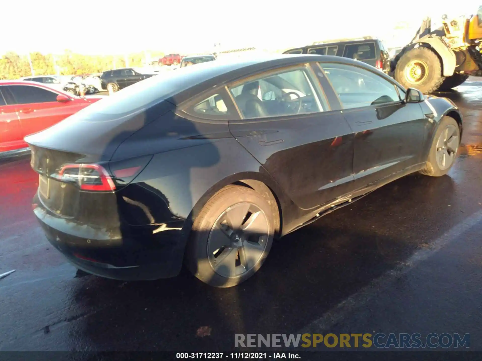 4 Photograph of a damaged car 5YJ3E1EAXMF923017 TESLA MODEL 3 2021