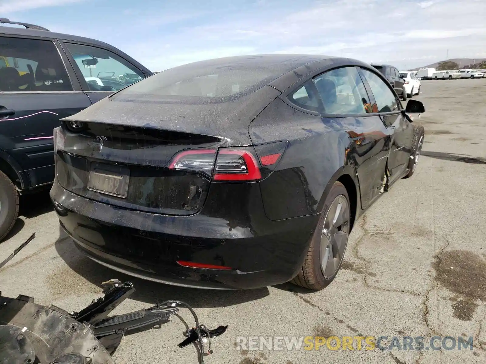 4 Photograph of a damaged car 5YJ3E1EAXMF930260 TESLA MODEL 3 2021