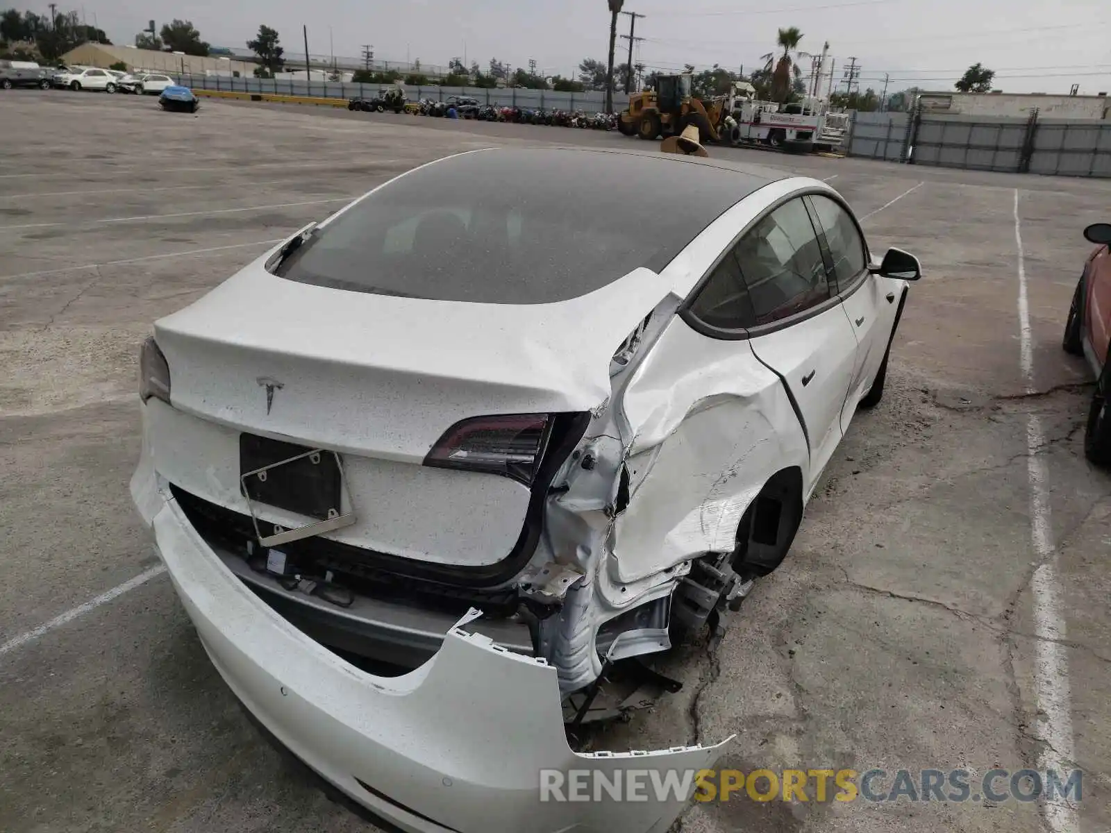 4 Photograph of a damaged car 5YJ3E1EAXMF939492 TESLA MODEL 3 2021