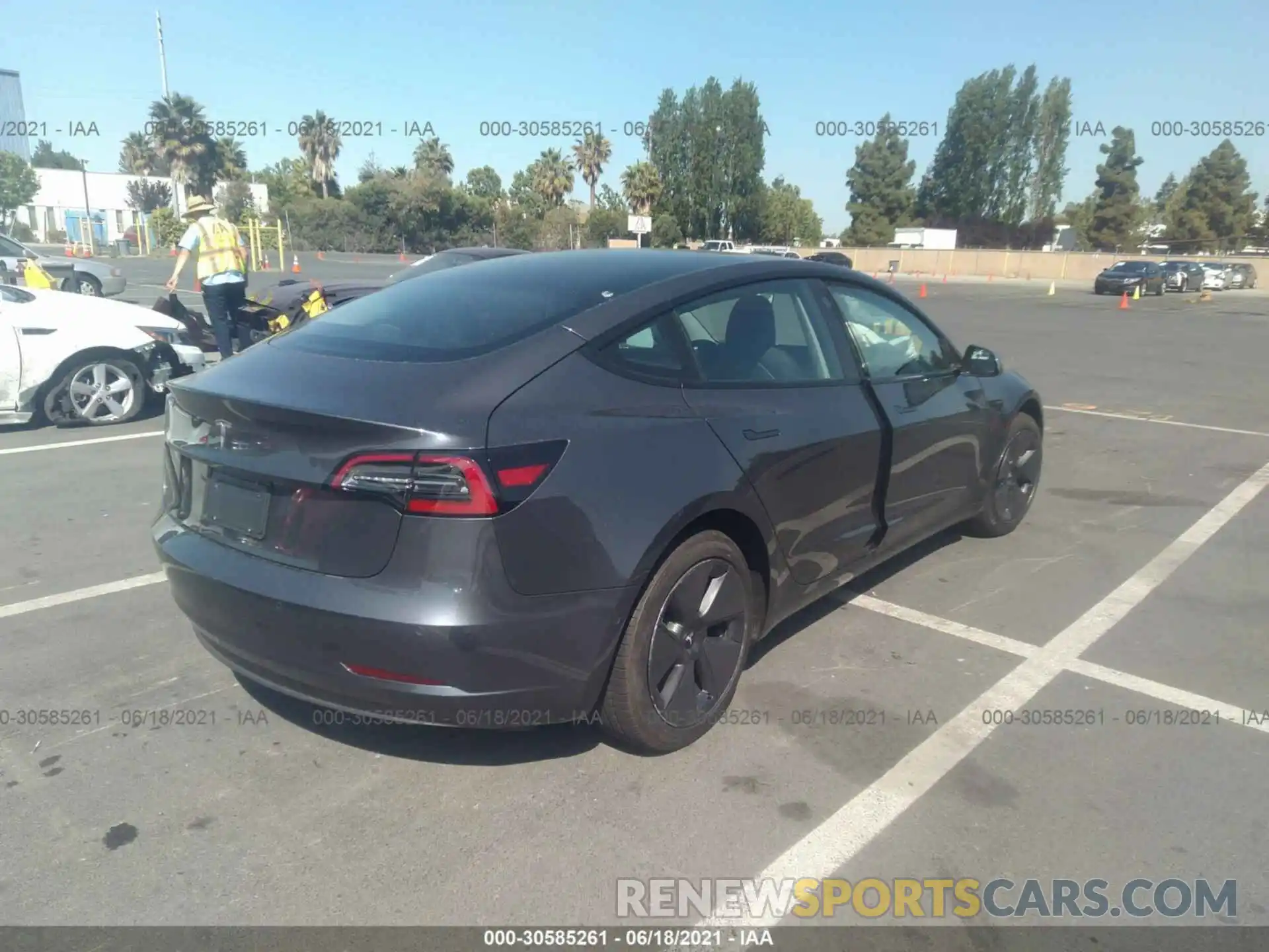 4 Photograph of a damaged car 5YJ3E1EAXMF961234 TESLA MODEL 3 2021