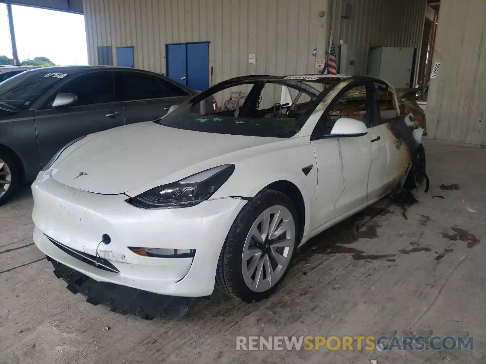 2 Photograph of a damaged car 5YJ3E1EAXMF978583 TESLA MODEL 3 2021