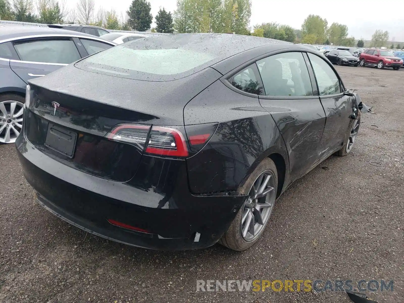 4 Photograph of a damaged car 5YJ3E1EAXMF985825 TESLA MODEL 3 2021