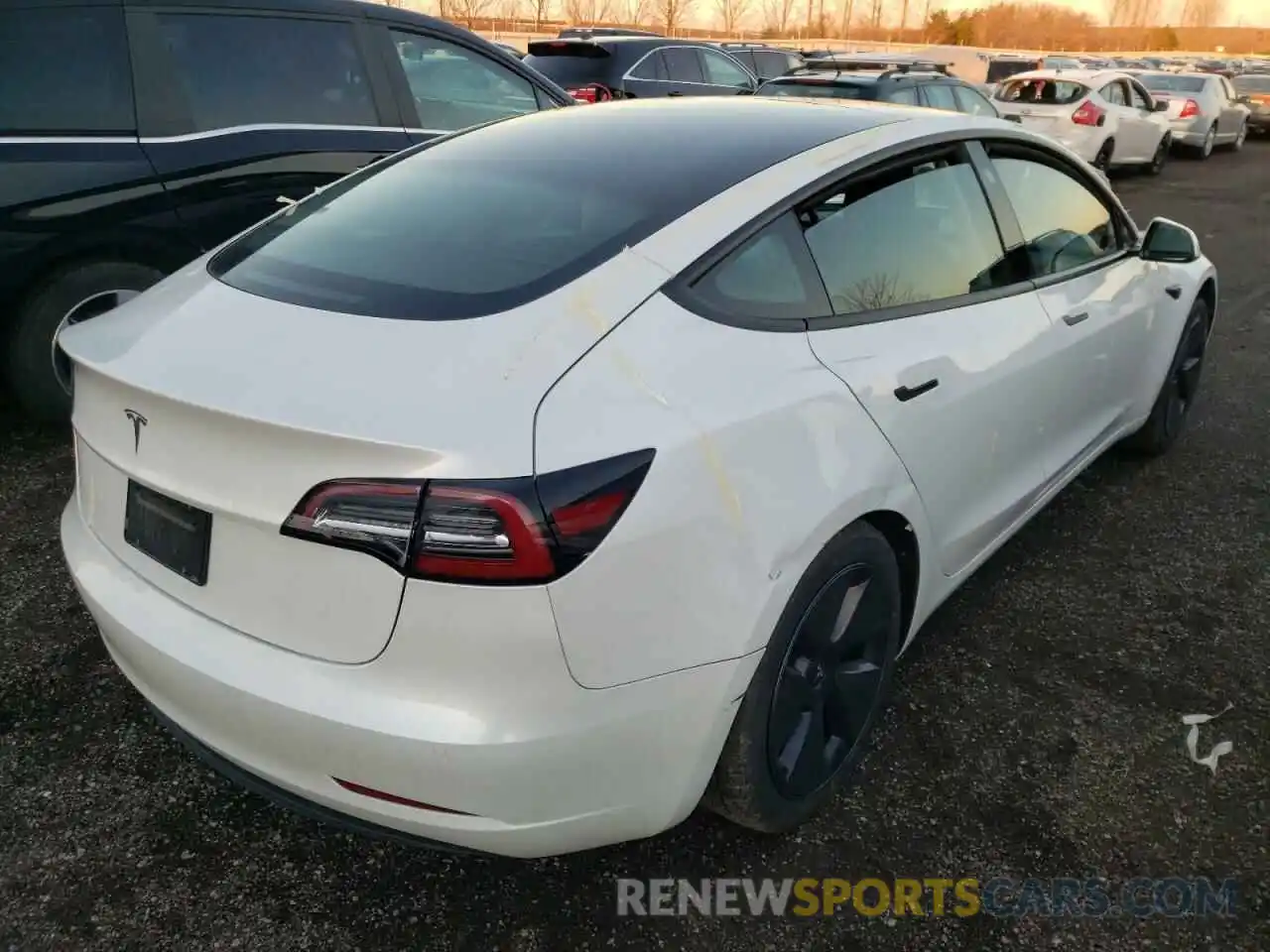 4 Photograph of a damaged car 5YJ3E1EAXMF985971 TESLA MODEL 3 2021