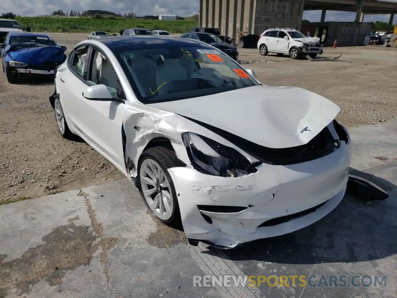 1 Photograph of a damaged car 5YJ3E1EAXMF989728 TESLA MODEL 3 2021