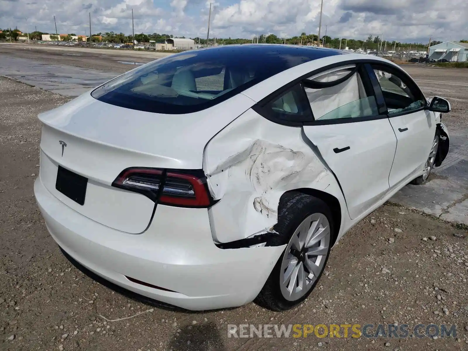 4 Photograph of a damaged car 5YJ3E1EAXMF989728 TESLA MODEL 3 2021