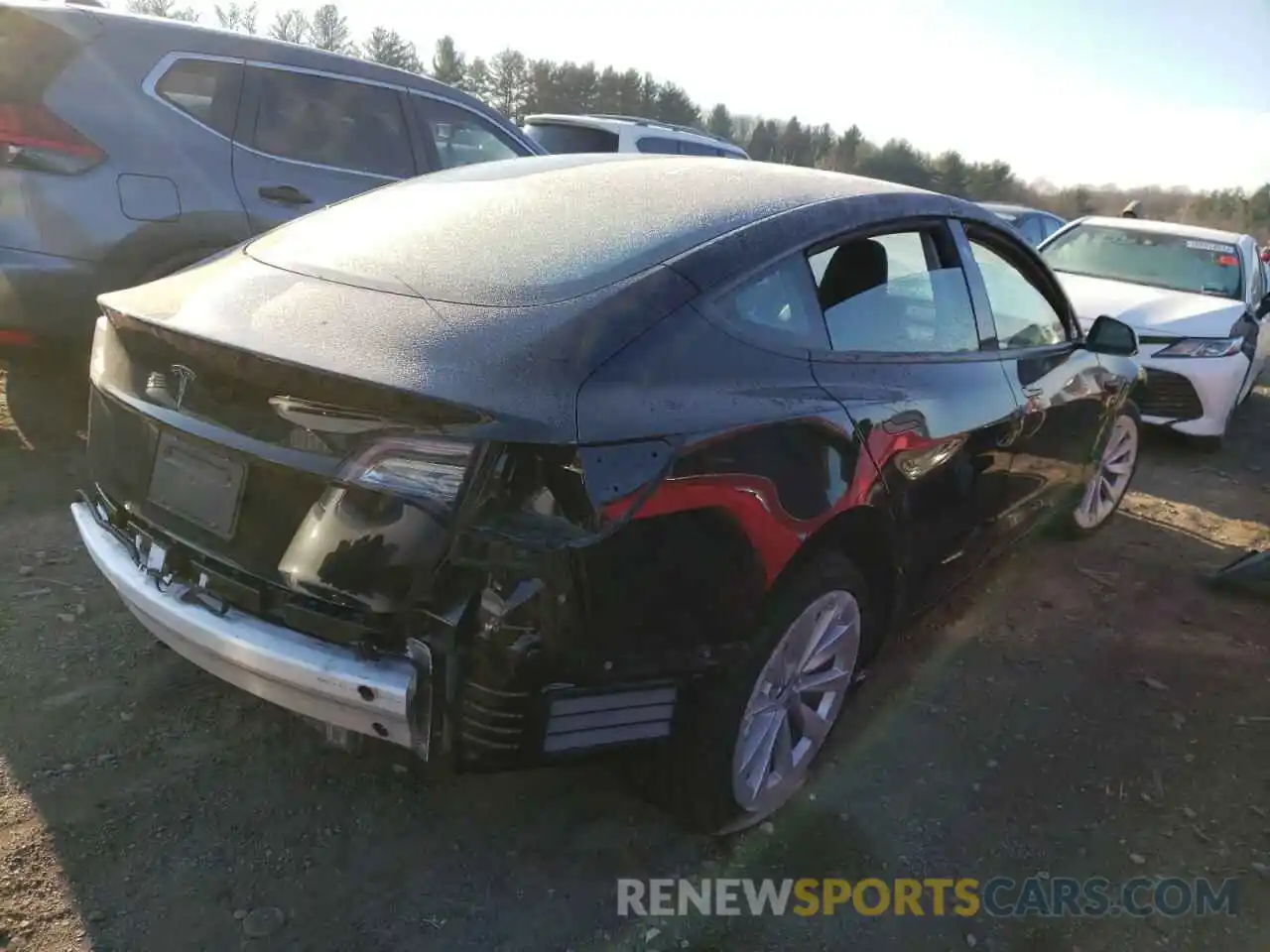 4 Photograph of a damaged car 5YJ3E1EAXMF990684 TESLA MODEL 3 2021