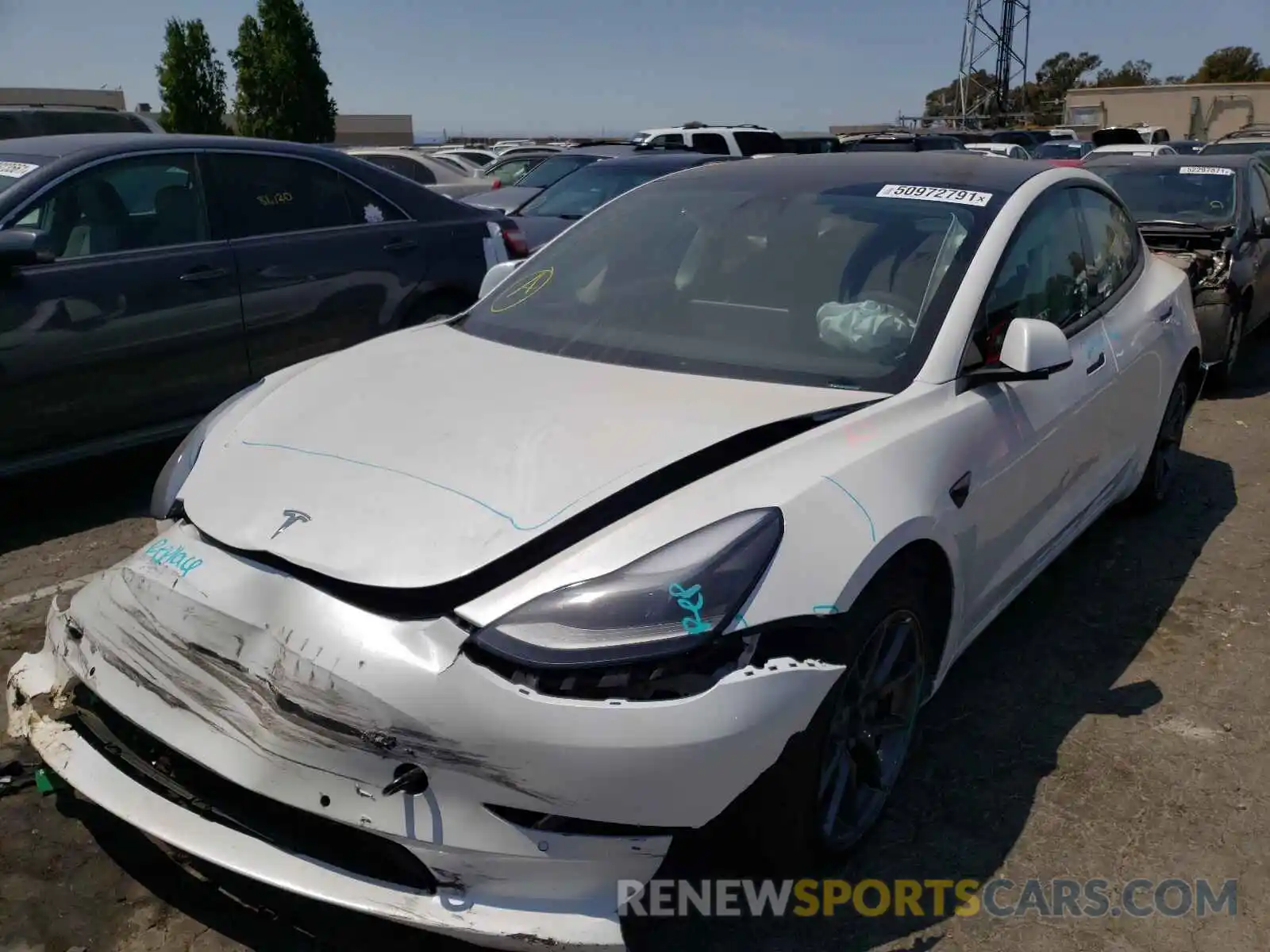 2 Photograph of a damaged car 5YJ3E1EB0MF002921 TESLA MODEL 3 2021