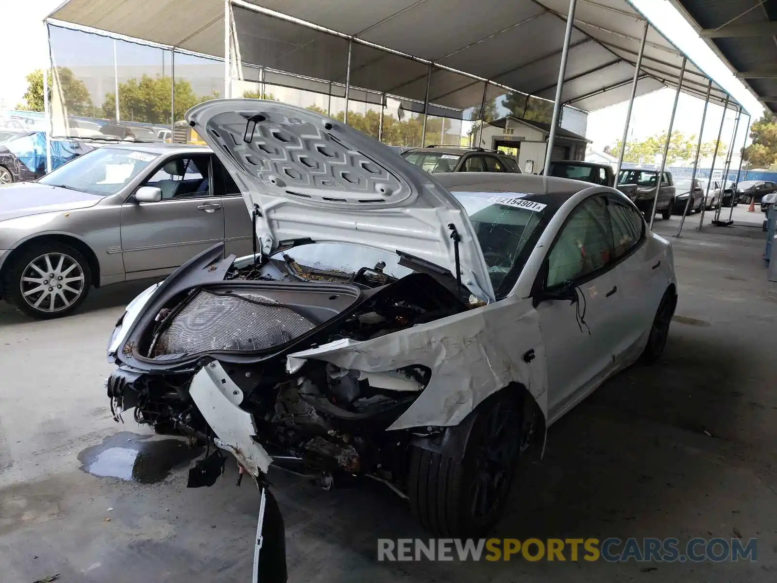 2 Photograph of a damaged car 5YJ3E1EB0MF003244 TESLA MODEL 3 2021