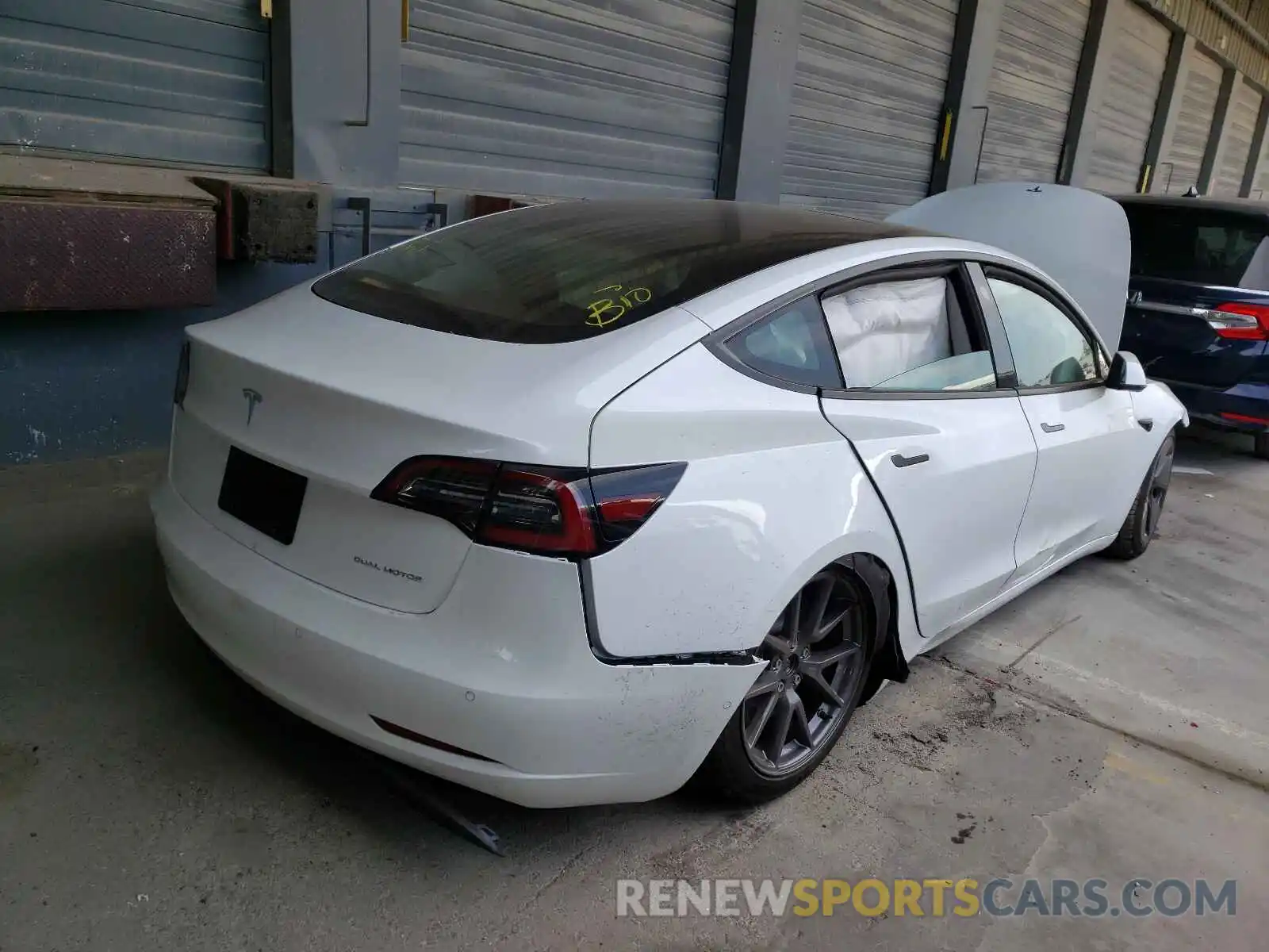 4 Photograph of a damaged car 5YJ3E1EB0MF003244 TESLA MODEL 3 2021