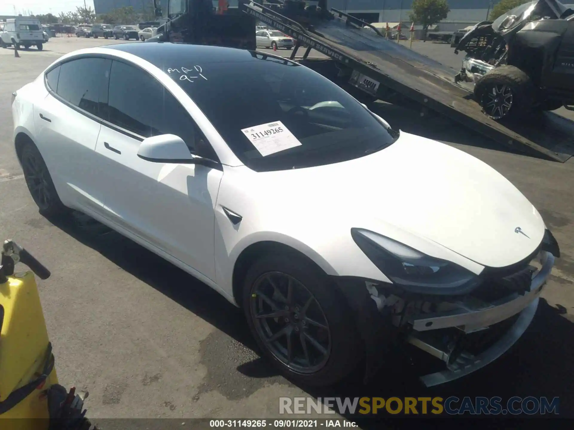 1 Photograph of a damaged car 5YJ3E1EB0MF007083 TESLA MODEL 3 2021