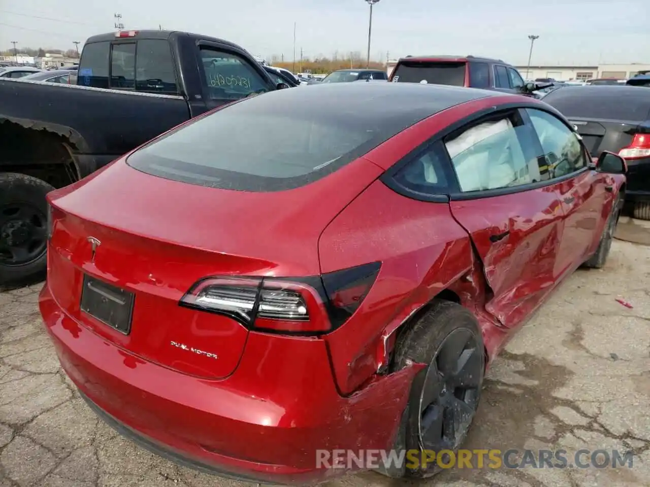 4 Photograph of a damaged car 5YJ3E1EB0MF029472 TESLA MODEL 3 2021