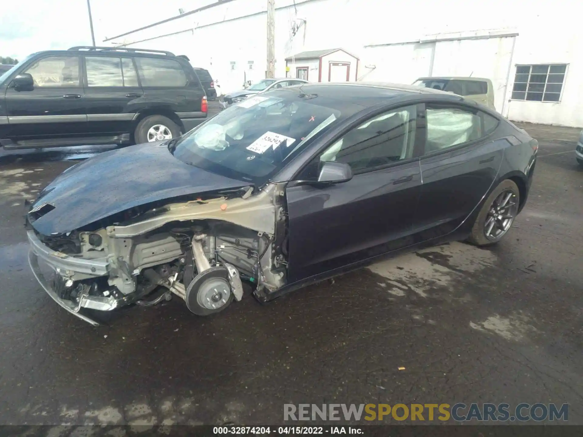 2 Photograph of a damaged car 5YJ3E1EB0MF033067 TESLA MODEL 3 2021