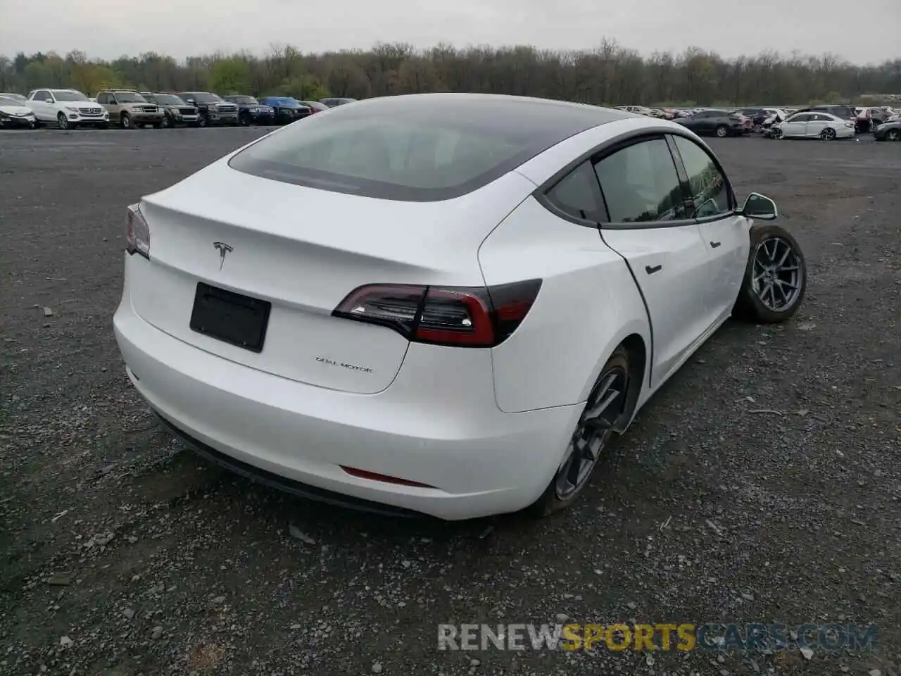 4 Photograph of a damaged car 5YJ3E1EB0MF063248 TESLA MODEL 3 2021