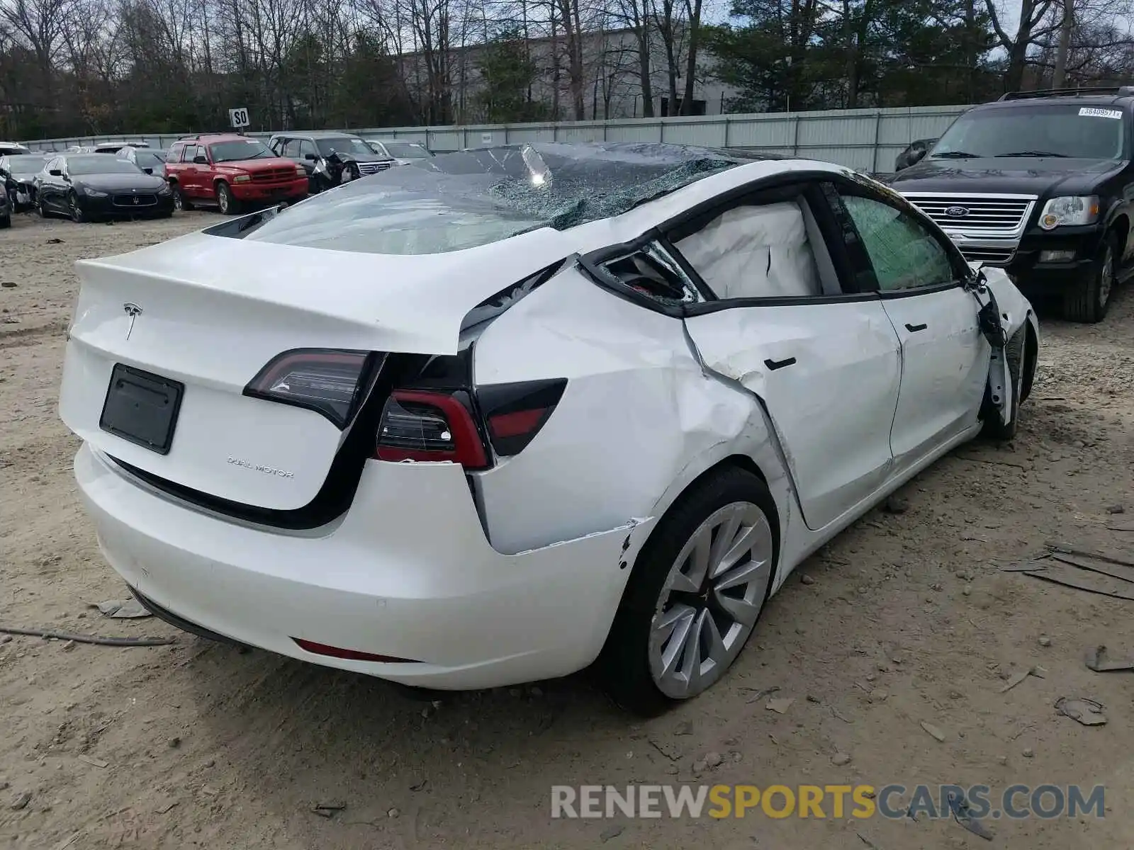 4 Photograph of a damaged car 5YJ3E1EB0MF906817 TESLA MODEL 3 2021