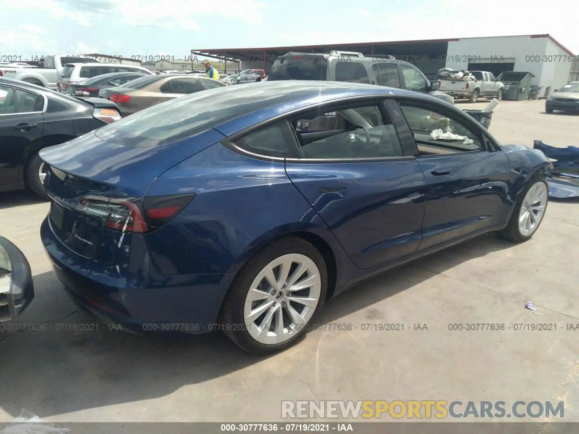 4 Photograph of a damaged car 5YJ3E1EB0MF960568 TESLA MODEL 3 2021