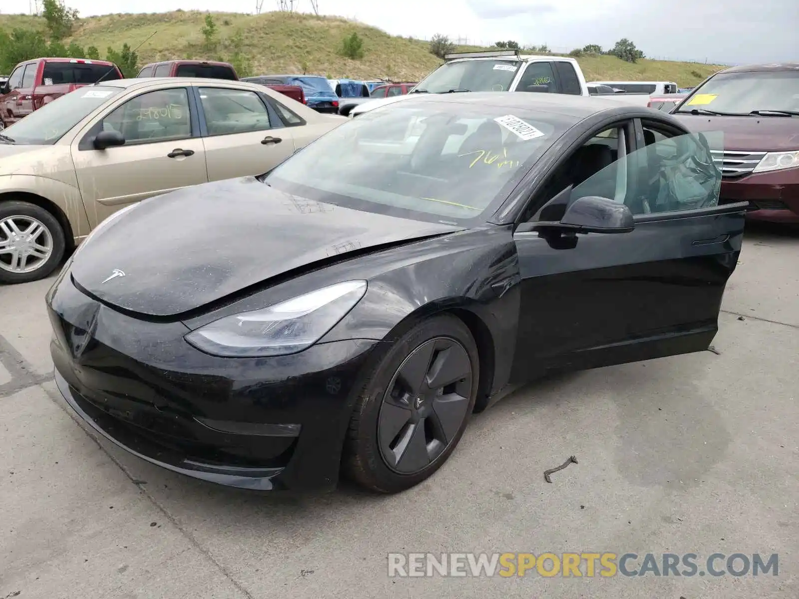 2 Photograph of a damaged car 5YJ3E1EB0MF974549 TESLA MODEL 3 2021