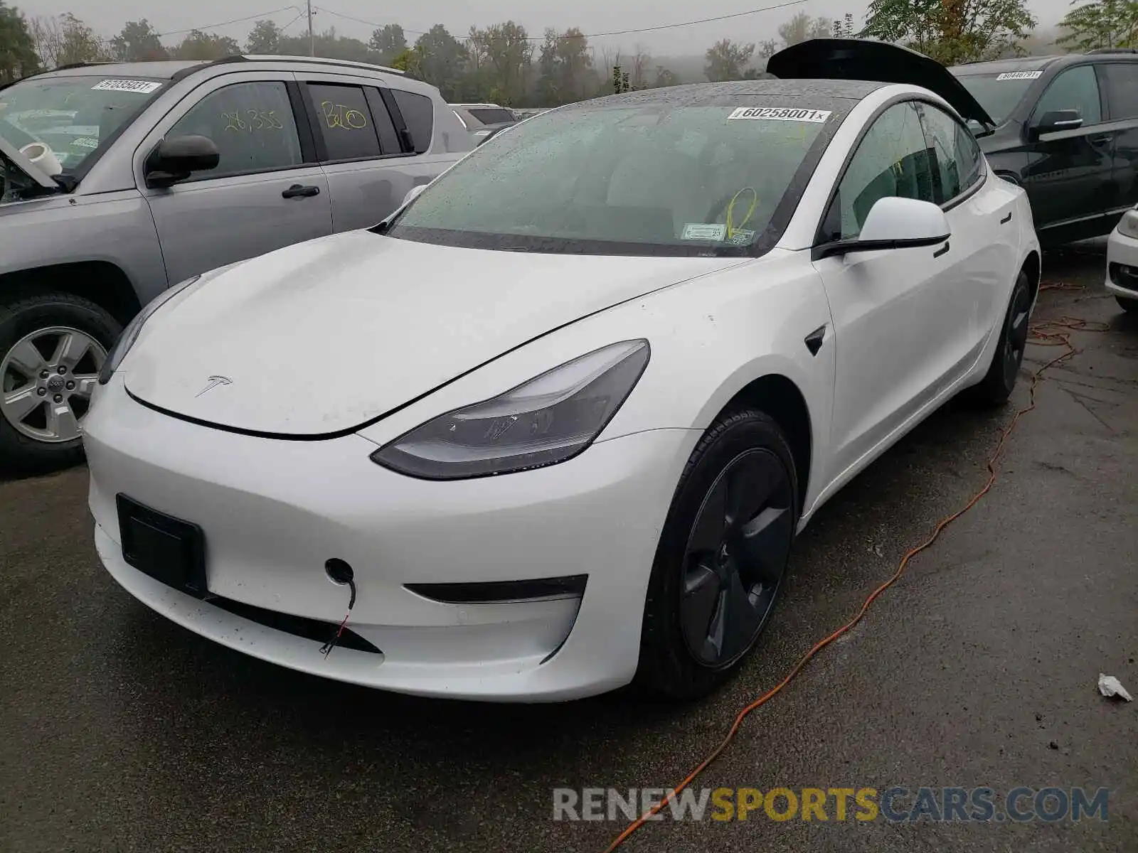 2 Photograph of a damaged car 5YJ3E1EB0MF981498 TESLA MODEL 3 2021