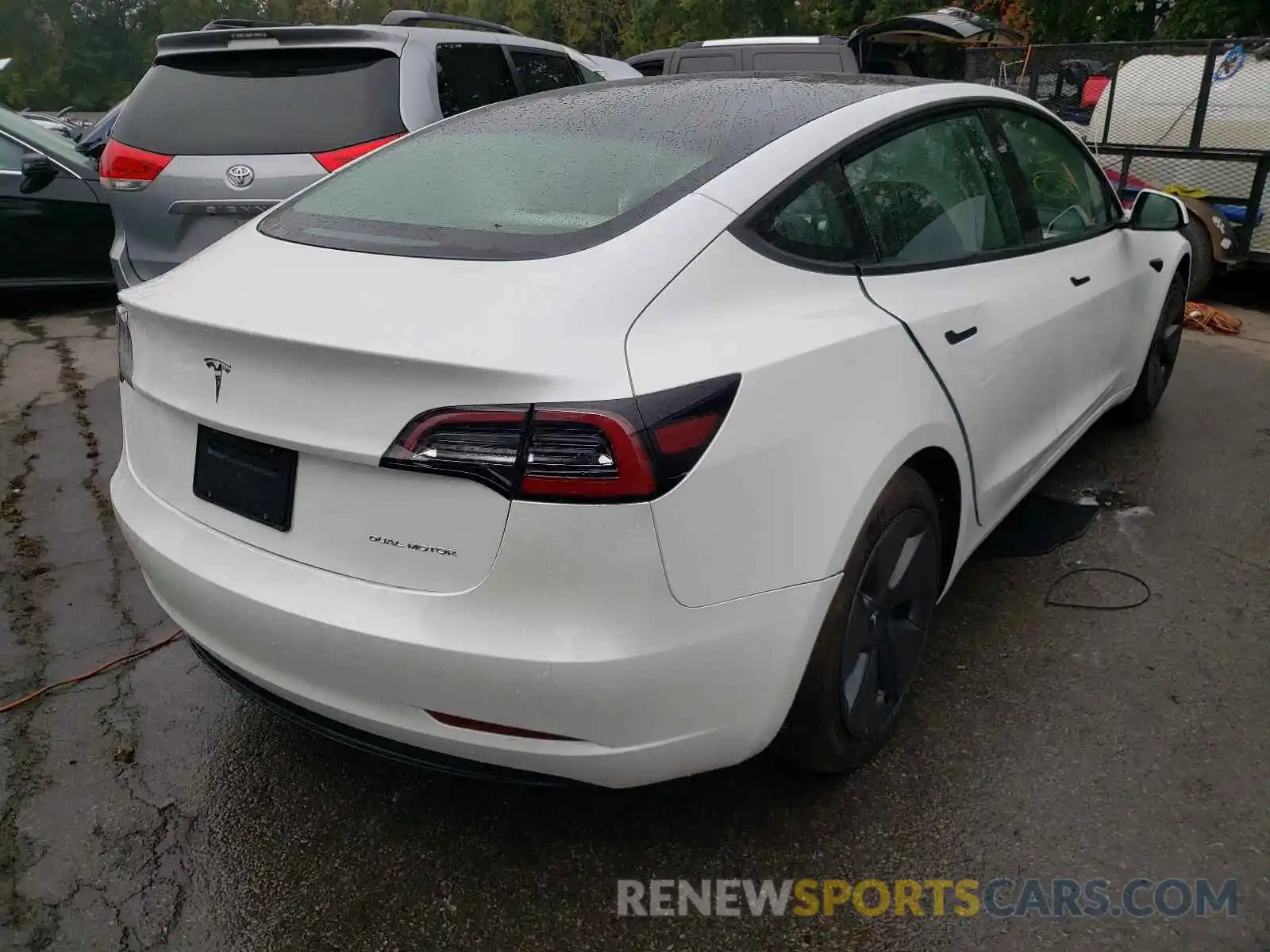 4 Photograph of a damaged car 5YJ3E1EB0MF981498 TESLA MODEL 3 2021