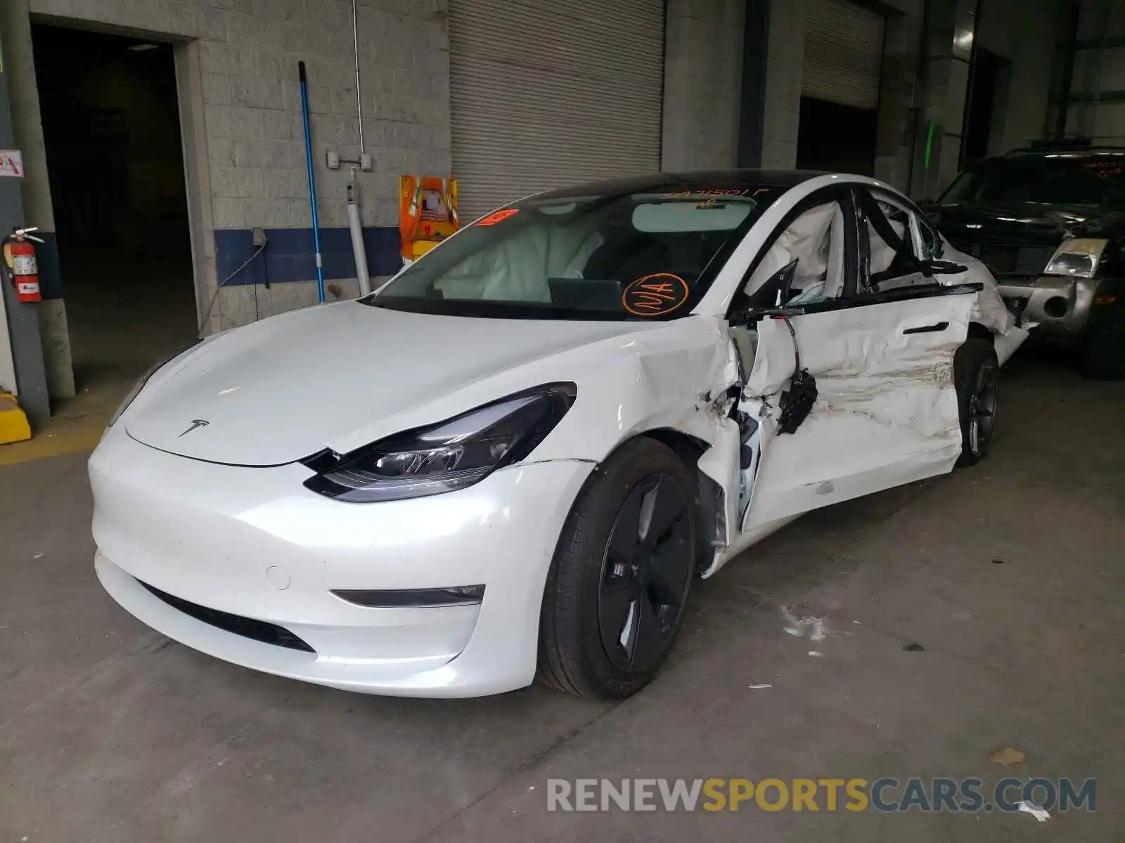 2 Photograph of a damaged car 5YJ3E1EB0MF984191 TESLA MODEL 3 2021