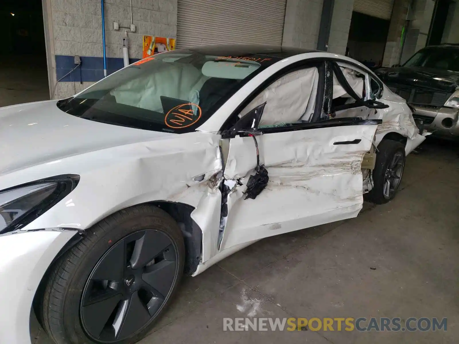 7 Photograph of a damaged car 5YJ3E1EB0MF984191 TESLA MODEL 3 2021