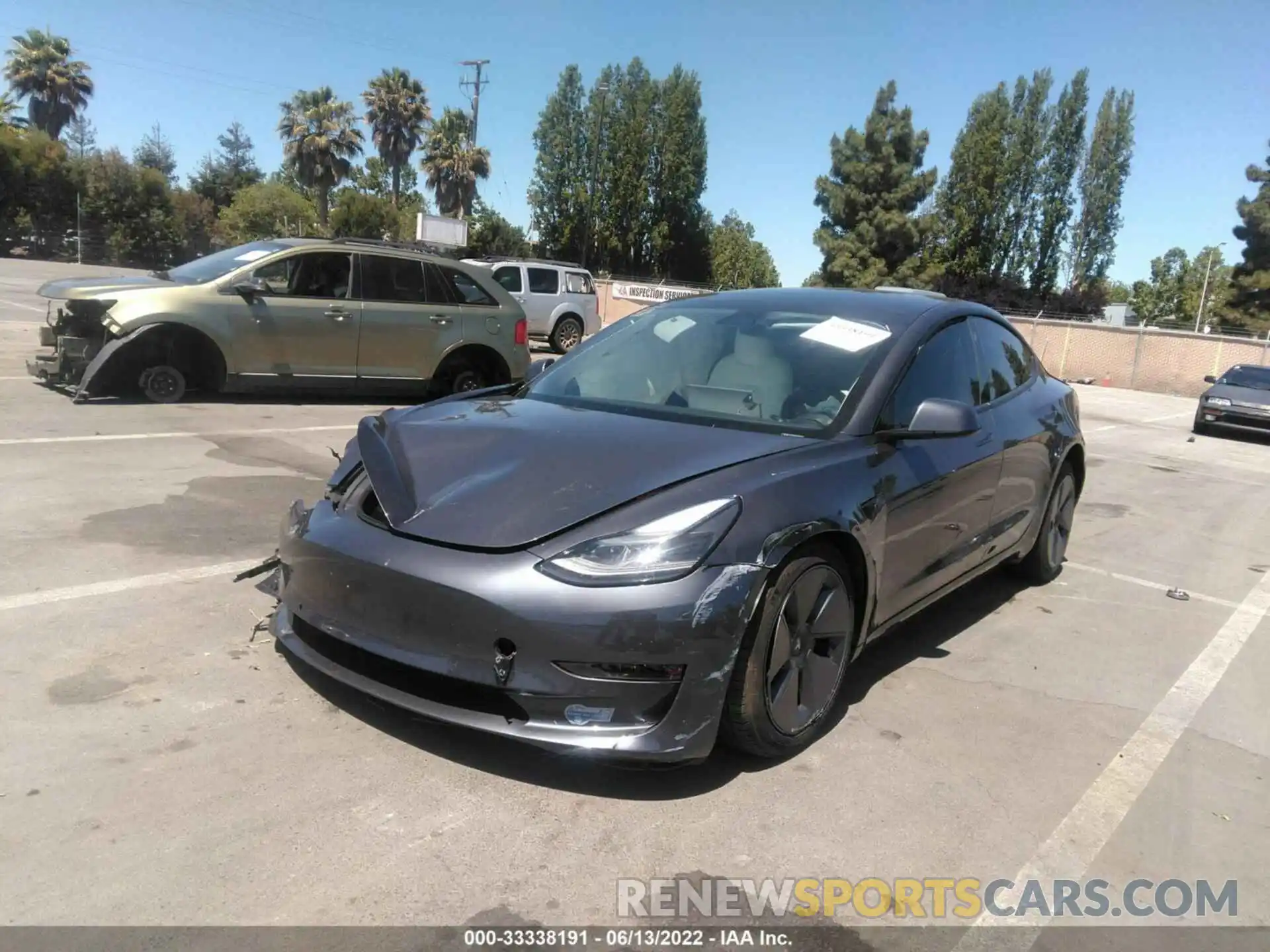 2 Photograph of a damaged car 5YJ3E1EB0MF999371 TESLA MODEL 3 2021