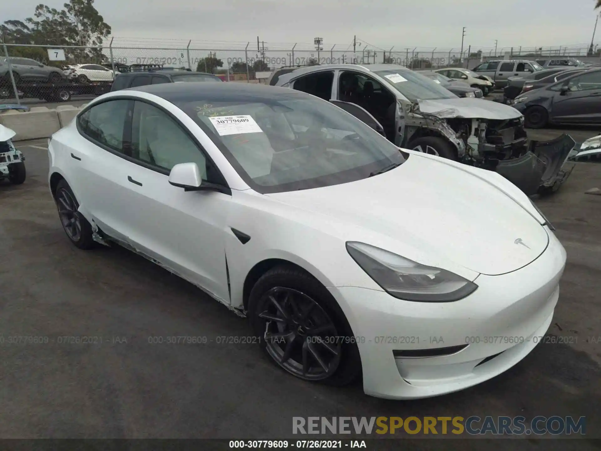 1 Photograph of a damaged car 5YJ3E1EB1MF001017 TESLA MODEL 3 2021