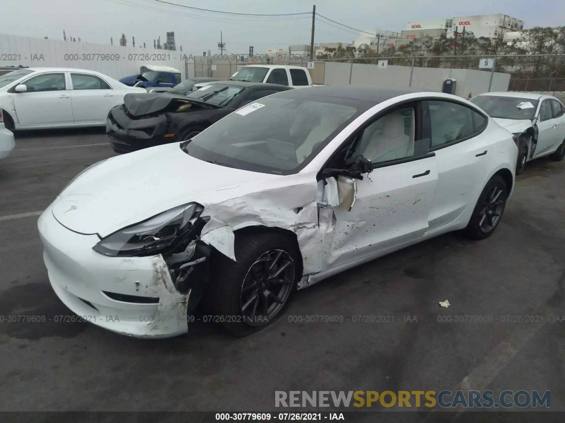 2 Photograph of a damaged car 5YJ3E1EB1MF001017 TESLA MODEL 3 2021