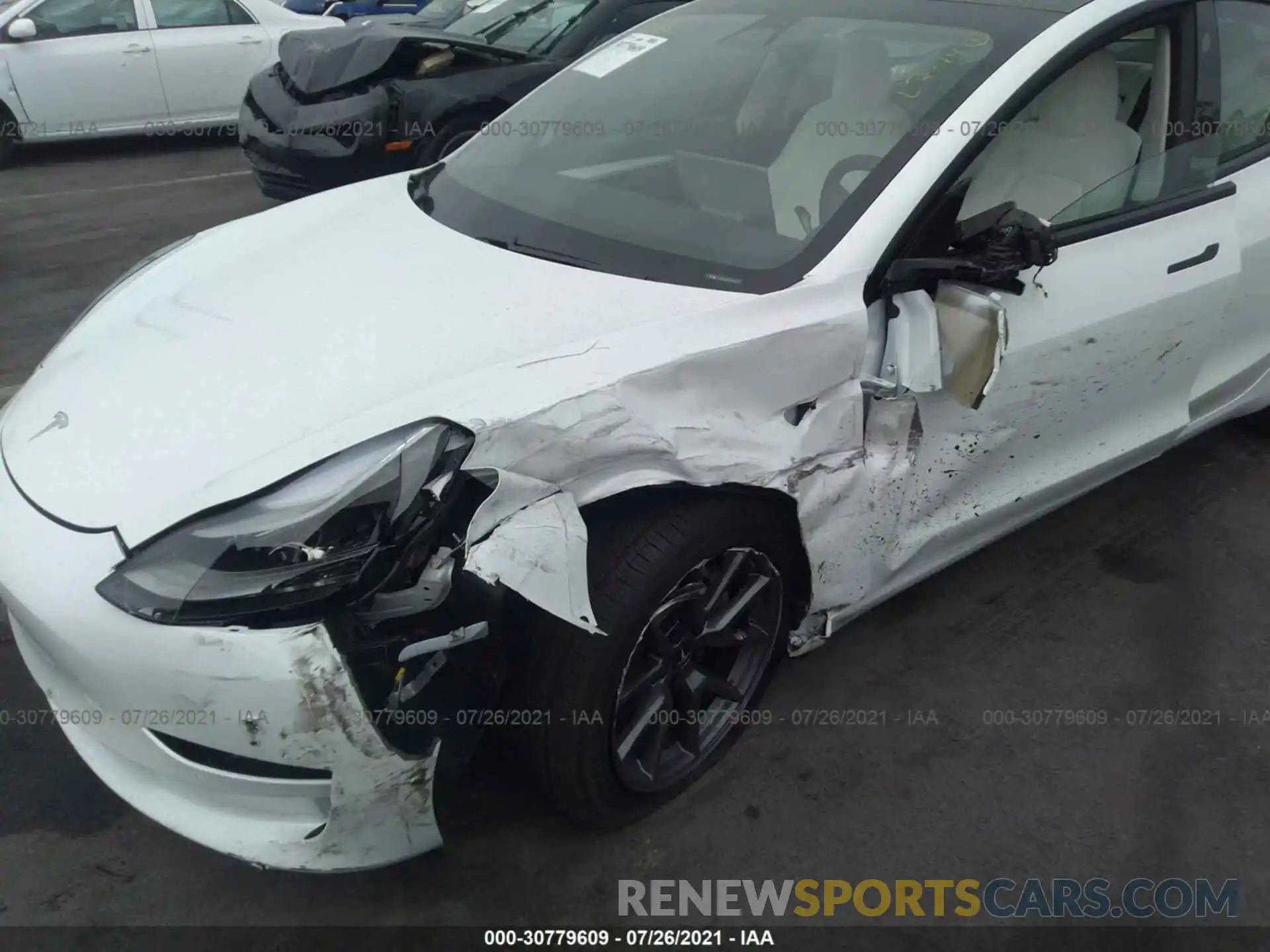 6 Photograph of a damaged car 5YJ3E1EB1MF001017 TESLA MODEL 3 2021