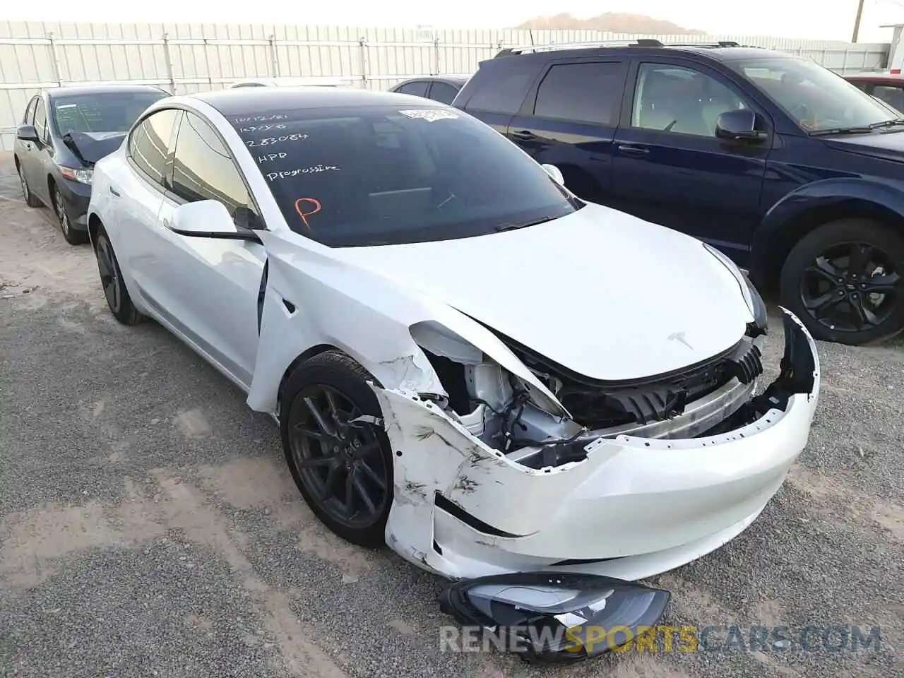 1 Photograph of a damaged car 5YJ3E1EB1MF002023 TESLA MODEL 3 2021