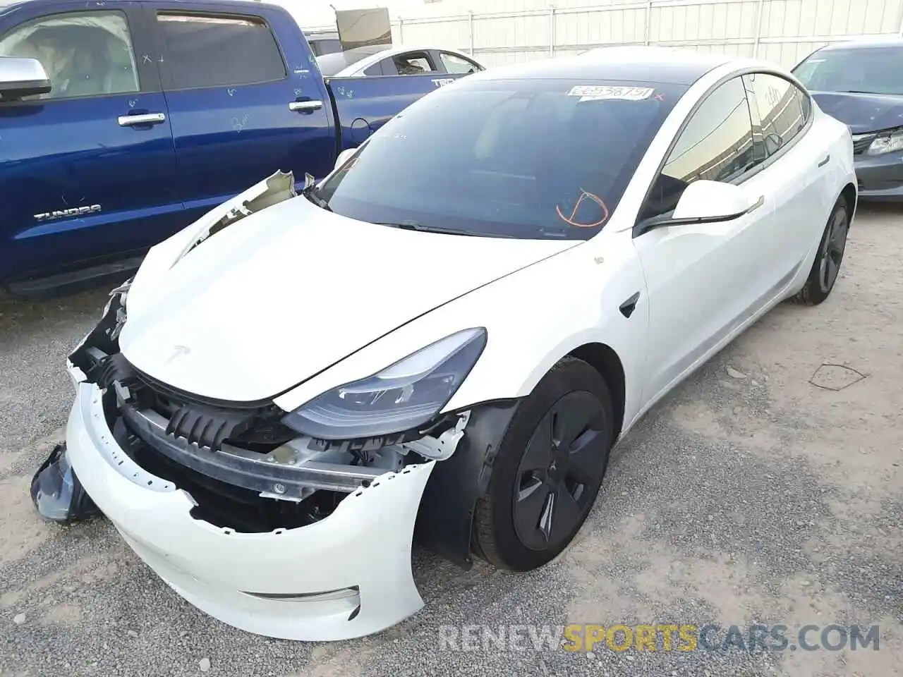 2 Photograph of a damaged car 5YJ3E1EB1MF002023 TESLA MODEL 3 2021