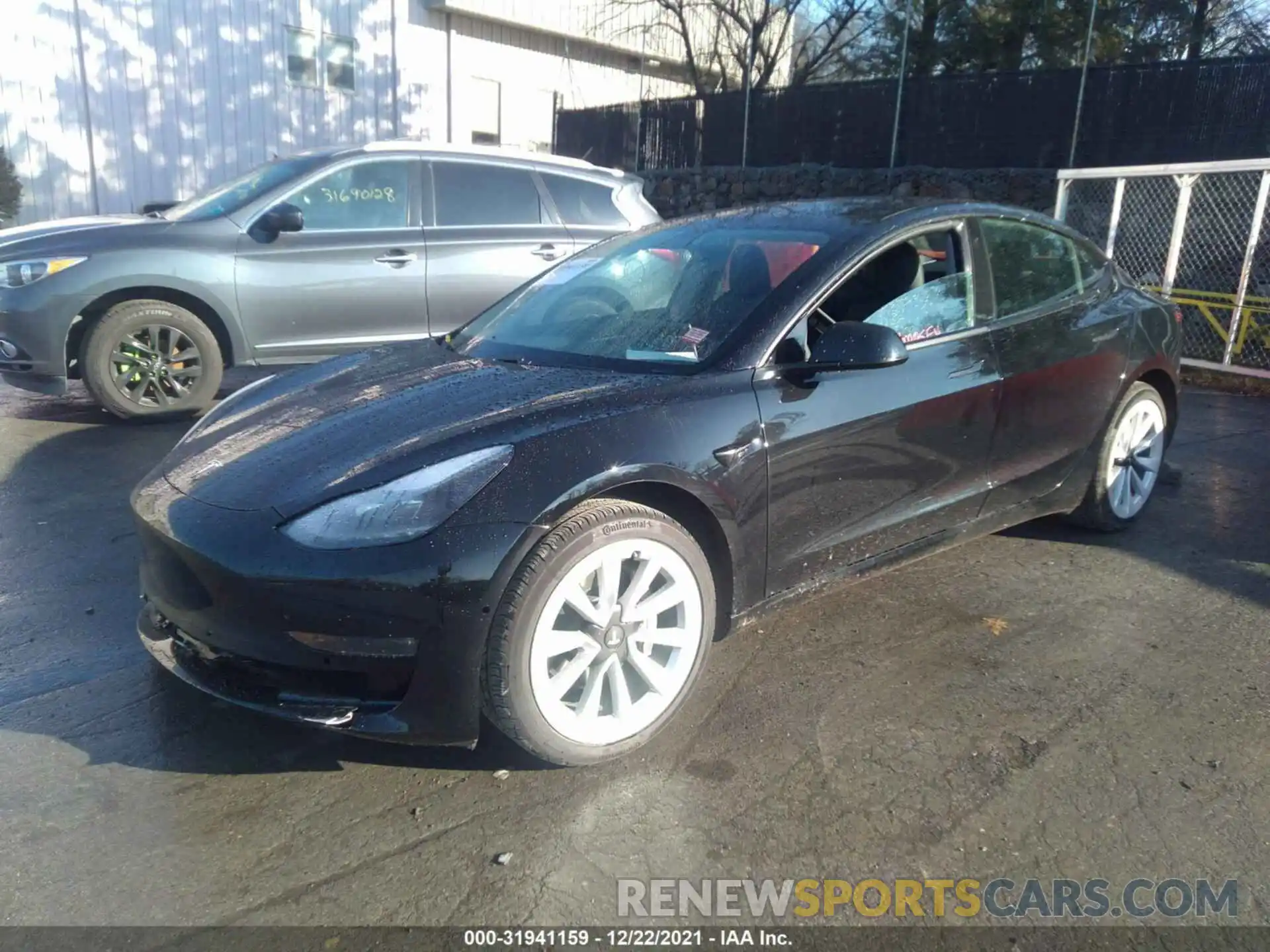 2 Photograph of a damaged car 5YJ3E1EB1MF044384 TESLA MODEL 3 2021