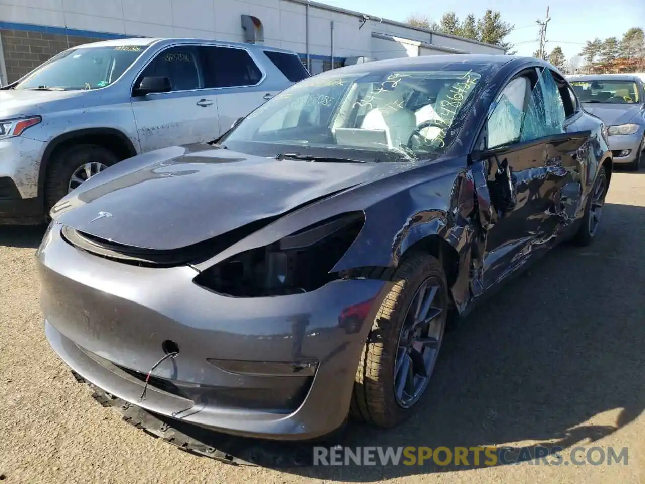 2 Photograph of a damaged car 5YJ3E1EB1MF048497 TESLA MODEL 3 2021