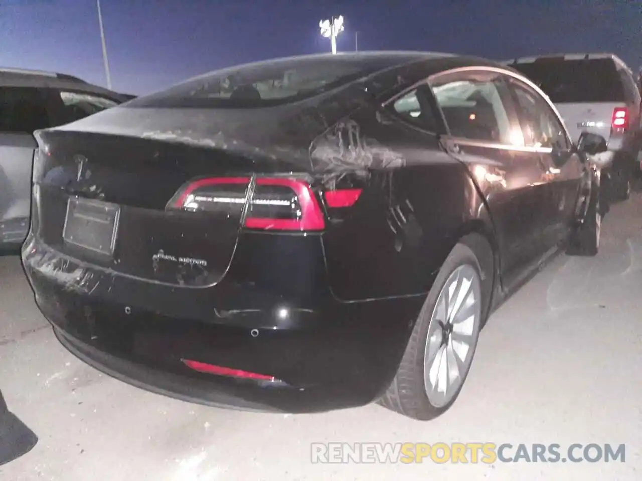 4 Photograph of a damaged car 5YJ3E1EB1MF071178 TESLA MODEL 3 2021