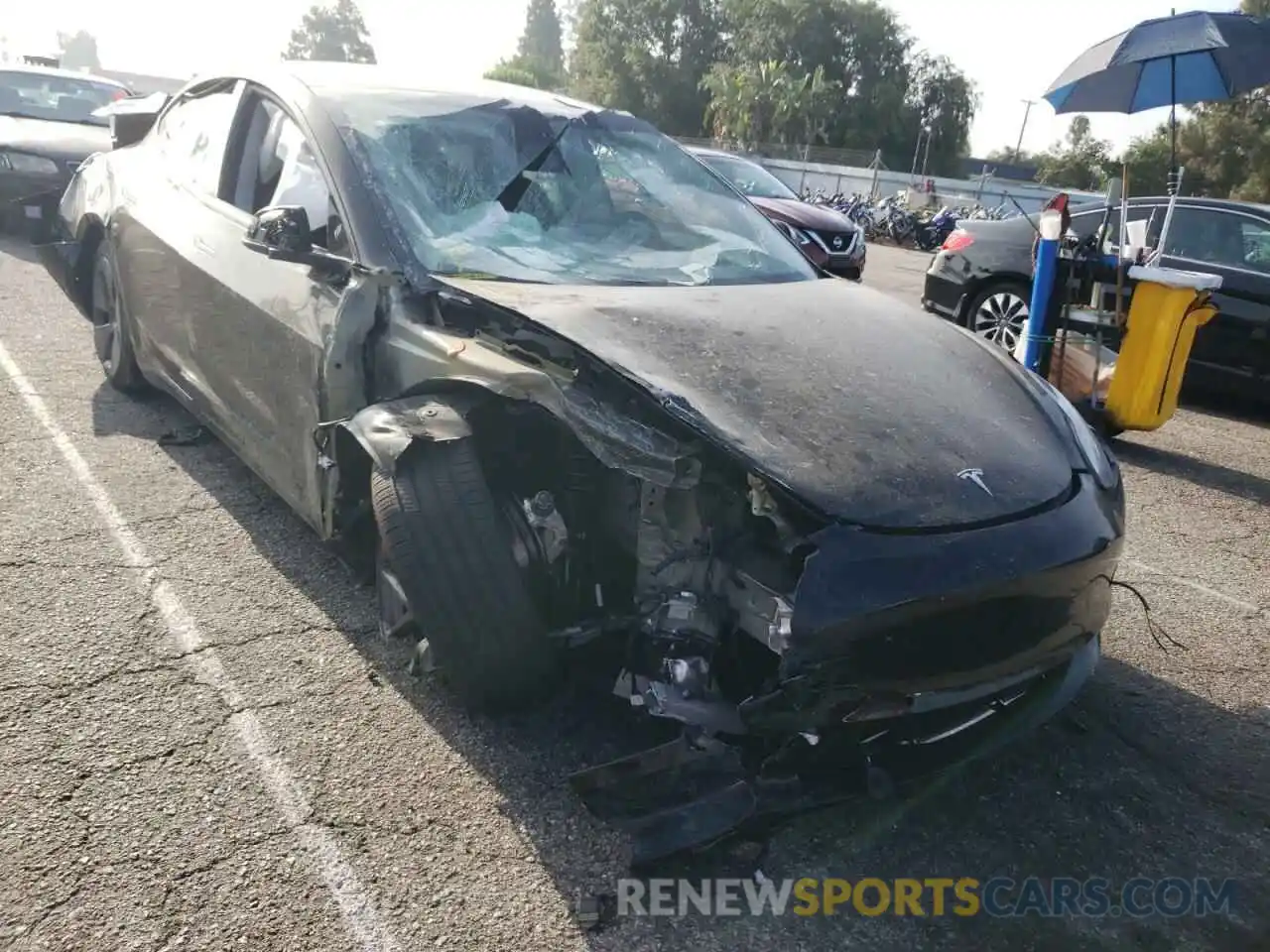 1 Photograph of a damaged car 5YJ3E1EB1MF073366 TESLA MODEL 3 2021