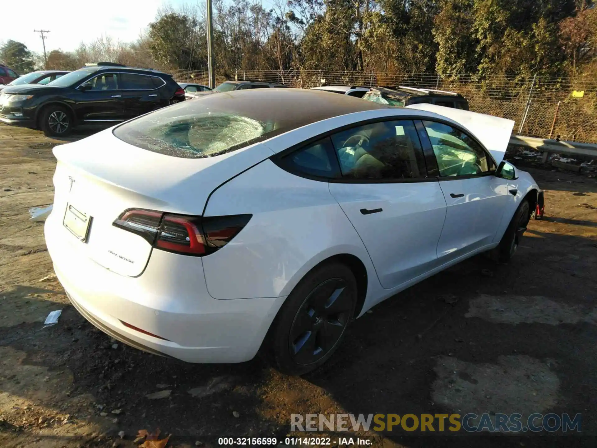 4 Photograph of a damaged car 5YJ3E1EB1MF081001 TESLA MODEL 3 2021